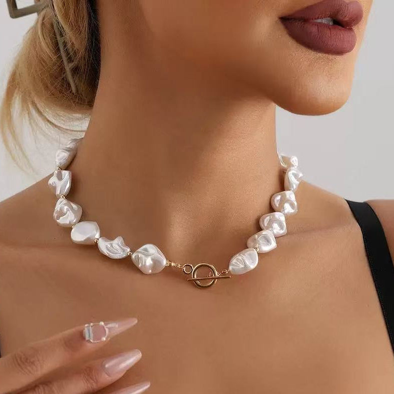Woman wearing Baroque Pearl Statement Necklace