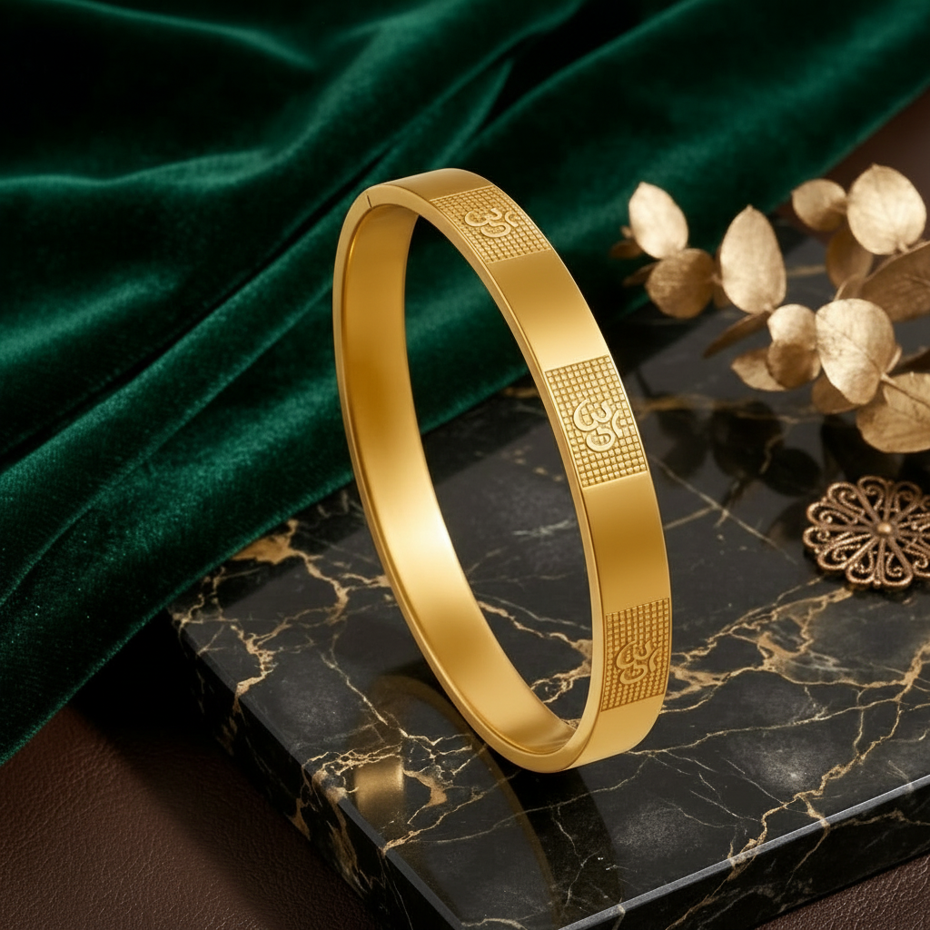 Close up of Mens Om Carved Gold Bracelet