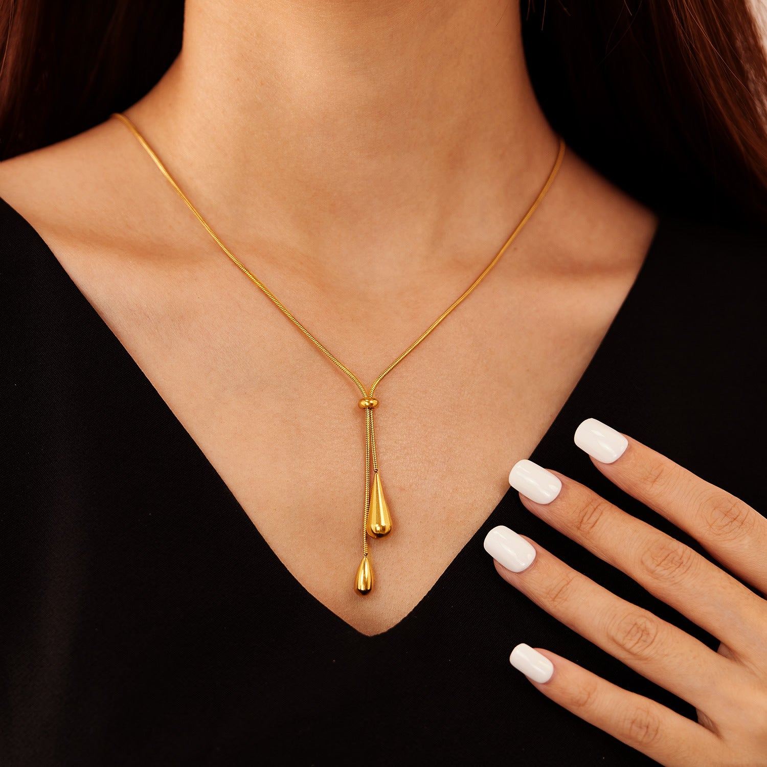 Women Wearing Gold Lariat Drop Necklace