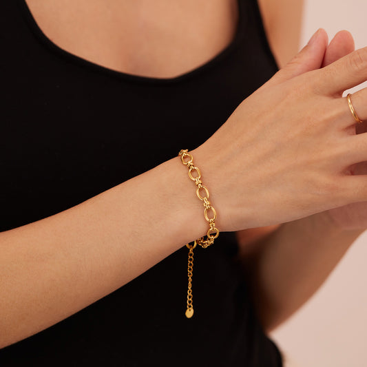 Woman Wearing Gold Mixed Link Bracelet
