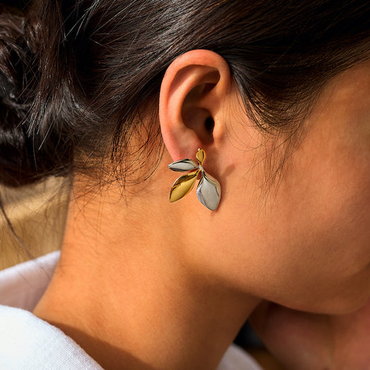 Woman Wearing Two-Tone Leaf Stud Earrings